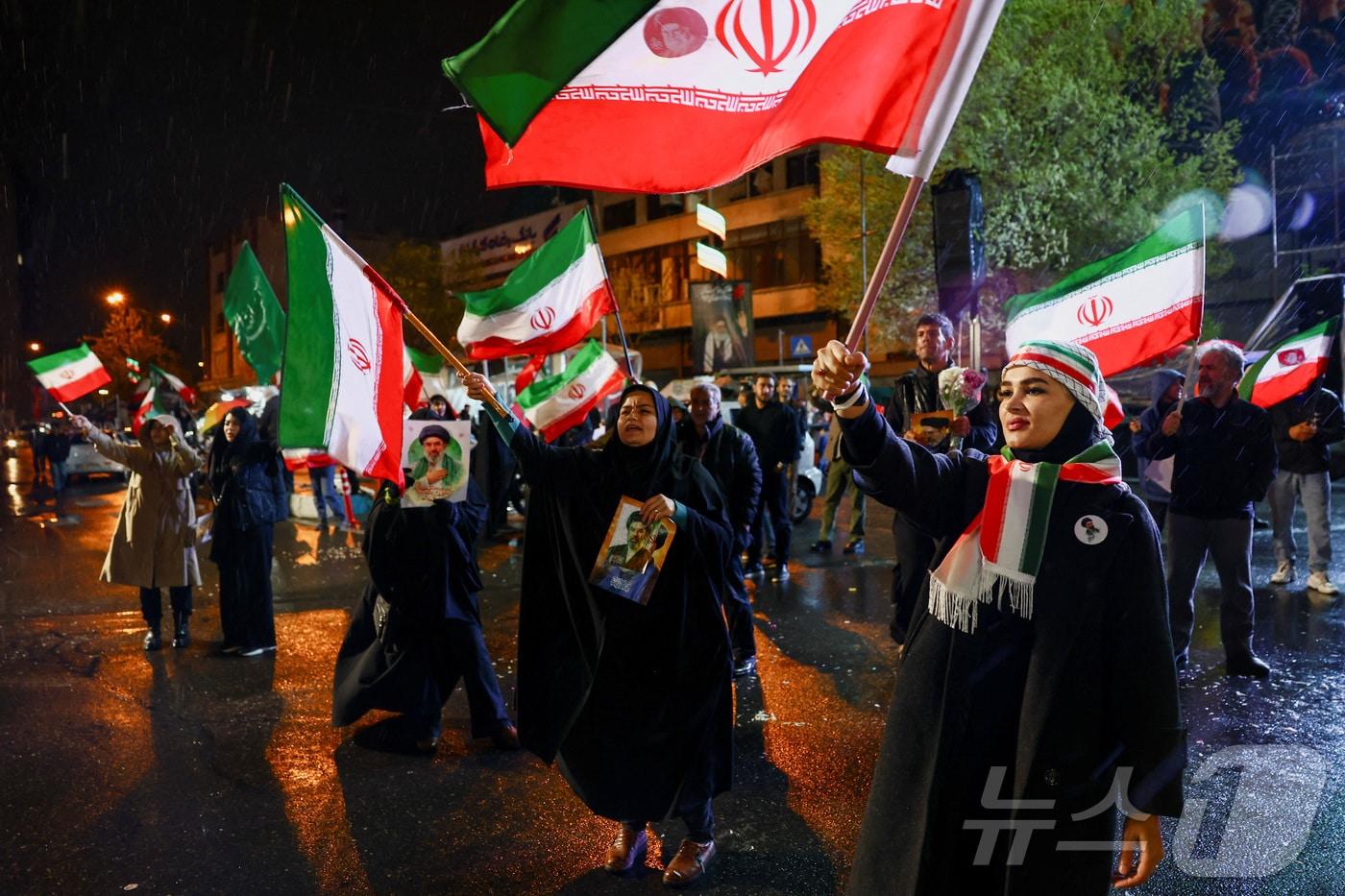 본문 이미지 - 지난 3월 26일(현지시간) 이란 수도 테헤란에서 반미·반이스라엘 집회가 열리고 있다. <자료사진> ⓒ 로이터=뉴스1
