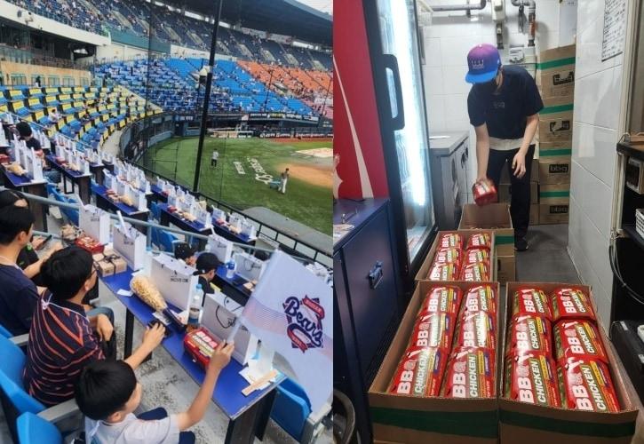 본문 이미지 - BBQ가 7일 오후 젠슨 황 엔비디아 CEO 시구와 경기를 관람하기 위해 잠실 구장을 찾은 엔비디아 단체석에 치킨을 배달했다. (BBQ 제공)