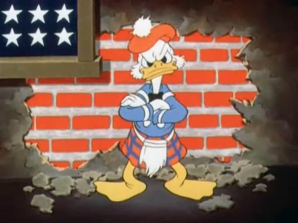 본문 이미지 - 스크루지로 분한 도널드 덕. (출처: Walt Disney Pictures for the US government, 1942, Public domain, via Wikimedia Commons)
