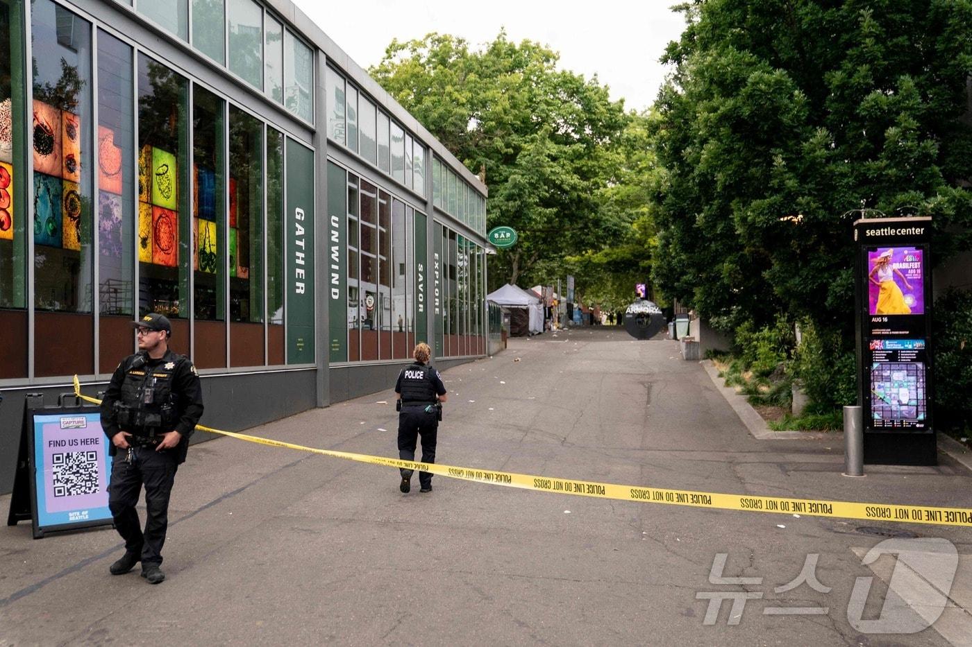 본문 이미지 - 총격 사건을 수사 중인 미국 경찰(특정 기사 내용과는 무관한 자료사진) ⓒ AFP=뉴스1