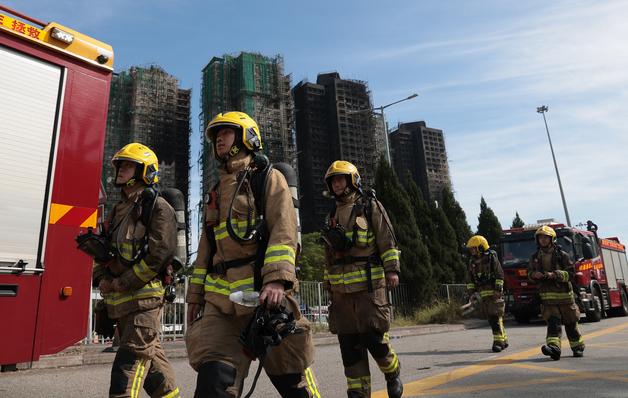 홍콩 아파트 화재 숨은 영웅들