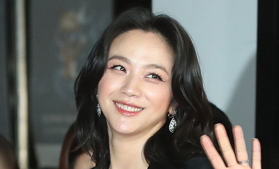 탕웨이, 우아한 미소