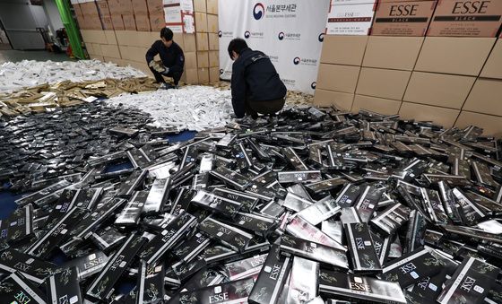 수출된 담배 국내 밀반입한 일당 검거