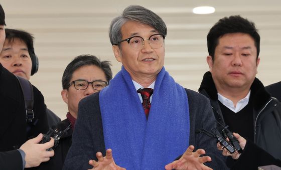 특검 도착해 기자 질문에 답하는 최재영 목사