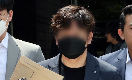 영장심사 마친 '중국간첩 99명' 보도 기자