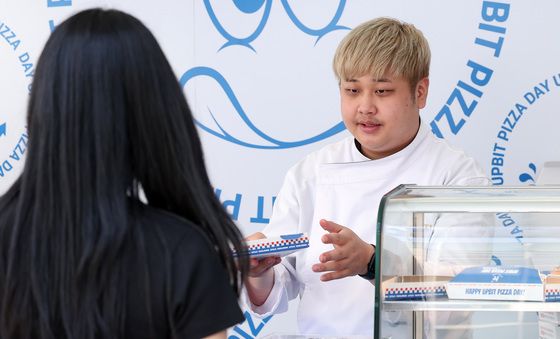 비트코인·피자 교환 거래하는 '피자데이'