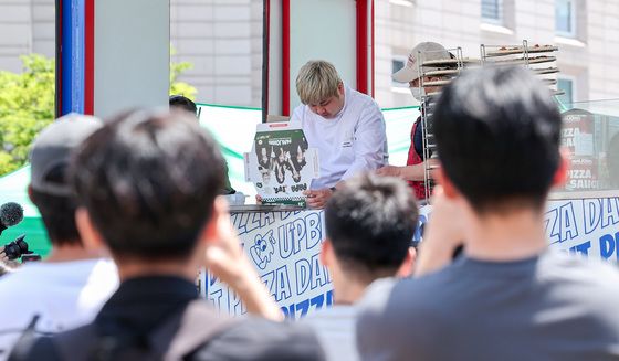 비트코인·피자 교환 거래하는 '피자데이'