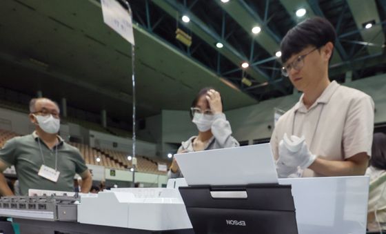 '투표지 분류기로 1차 분류'