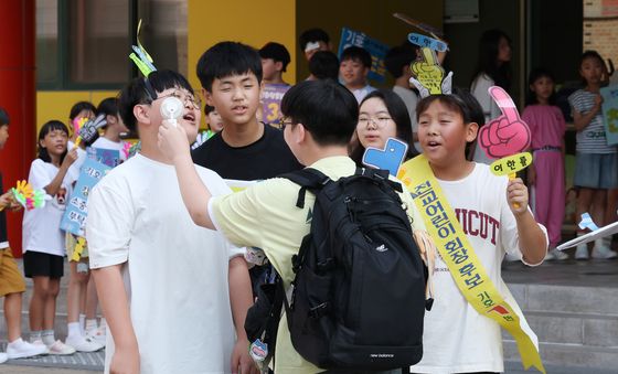 더위도 잊은 선거운동