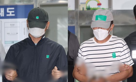 구속 송치되는 'KT무단결제 사건' 중국인 피의자 2명