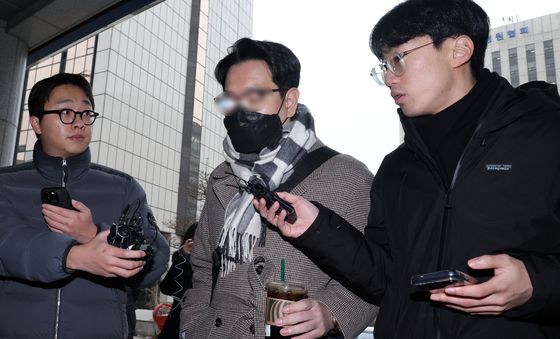 김병기 전 보좌관, 경찰 조사 출석