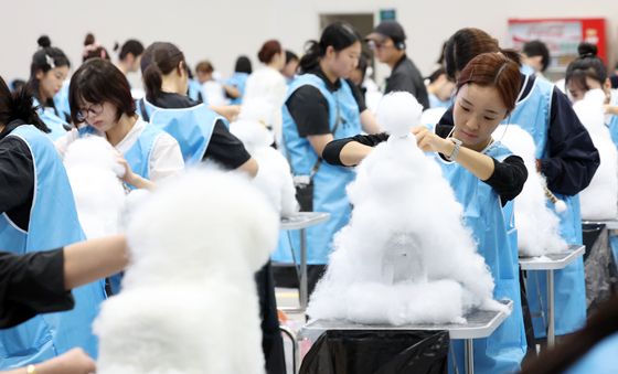 펫 미용 전문가들, 최고의 기술 선보여