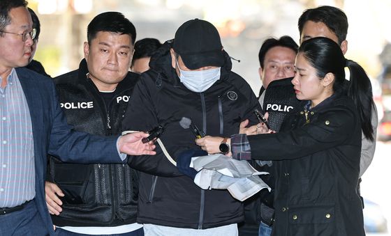 법정 향하는 역삼동 연쇄방화 피의자