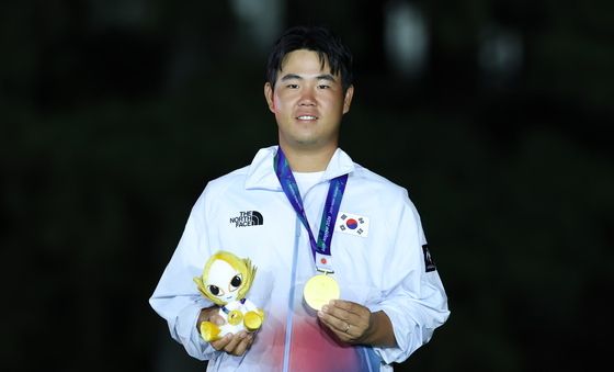 김주형, 금빛 미소