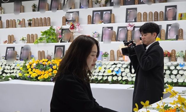 유가족, 여객기 참사 설 합동차례