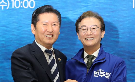 손잡은 정청래 대표와 전재수 부산시장 후보