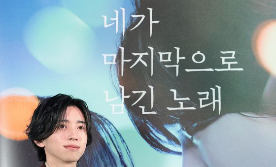 미소 짓는 미치에다 슌스케