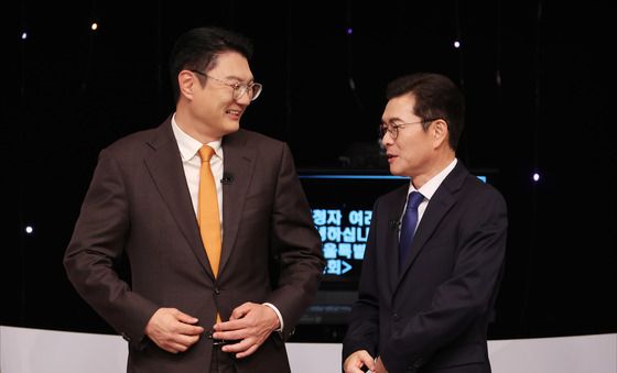대화 나누는 정원오·김정철 후보