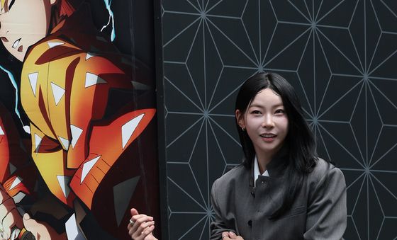 김민지 '귀멸의 칼날' 전시회 온 육상계의 카리나