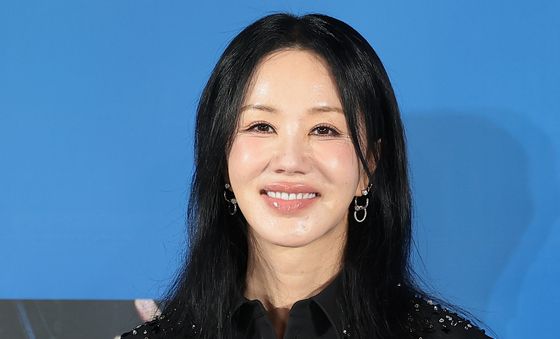 엄정화, 오케이 미소