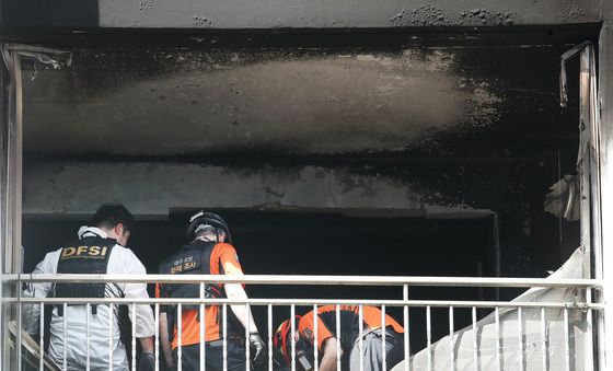 폭염 속 아파트 화재 조사