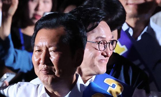 연설회 입장하는 김민석·정청래