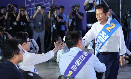 악수하는 정청래·김민석