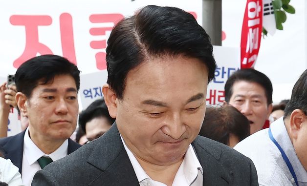 지지자들 응원 받으며 특검 출석하는 원희룡 전 장과