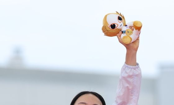 성승민, 한국 첫 금메달