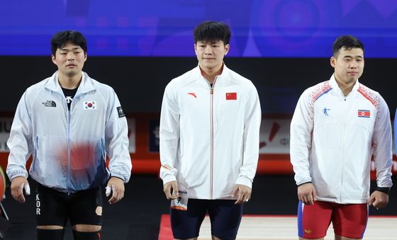 역도 남자 85kg 결승서 만난 남북